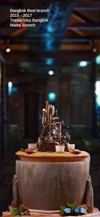 a cake with a machine on top of it